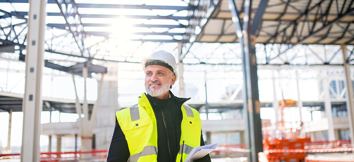 man-engineer-with-walkie-talkie-standing-on-constr-small.jpg